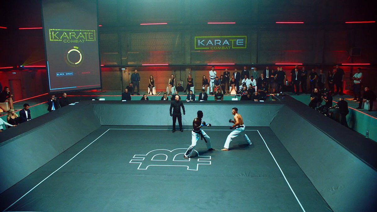 Karate Combat Fighting Arena Features Bitcoin Symbol 