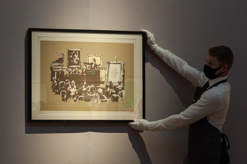 A Group of Crypto Proponents Burned an Original Banksy 'Morons' Print and Turned It Into an NFT A Group of Crypto Proponents Burned an Original Banksy 'Morons' Print and Turned It Into an NFT