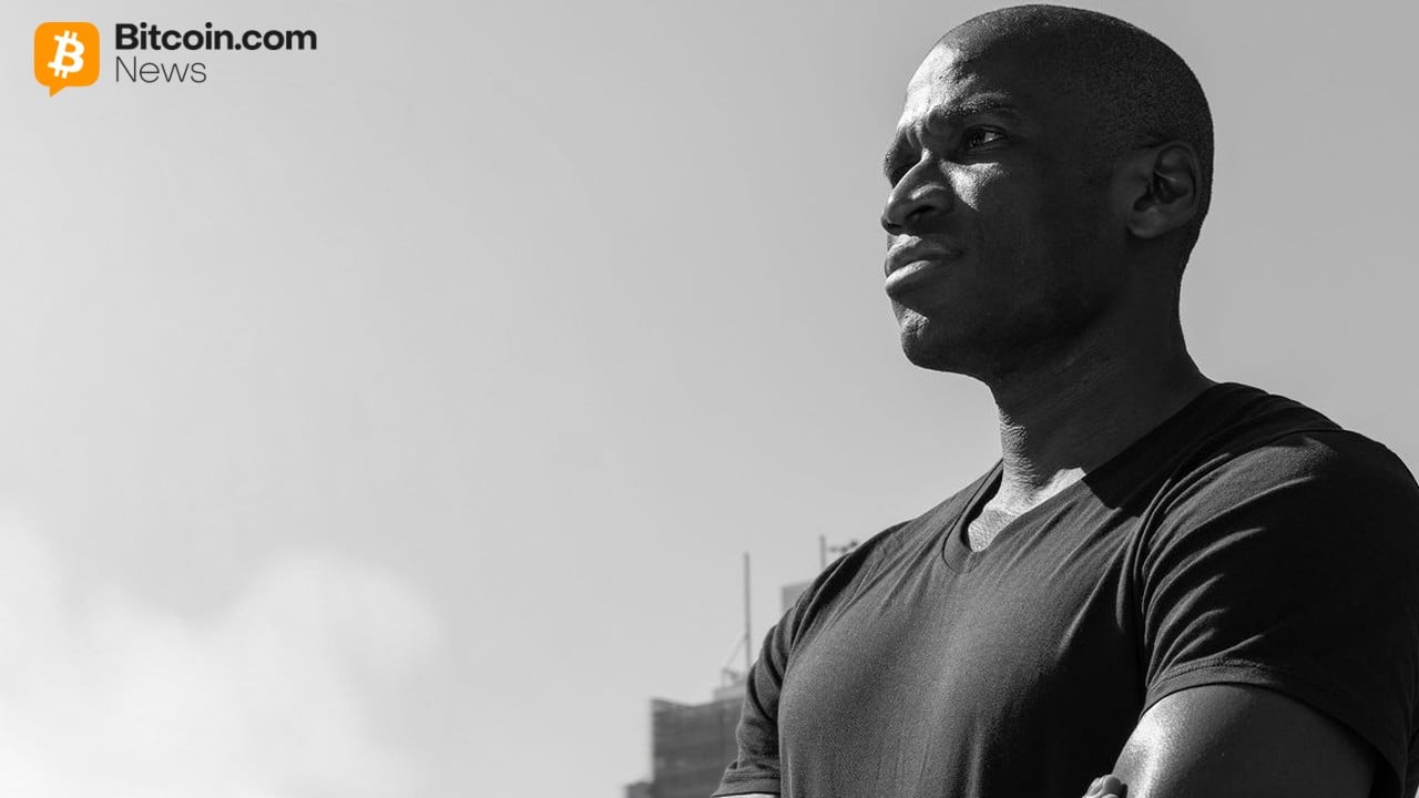 Arthur Hayes Standing With Sky as Backdrop
