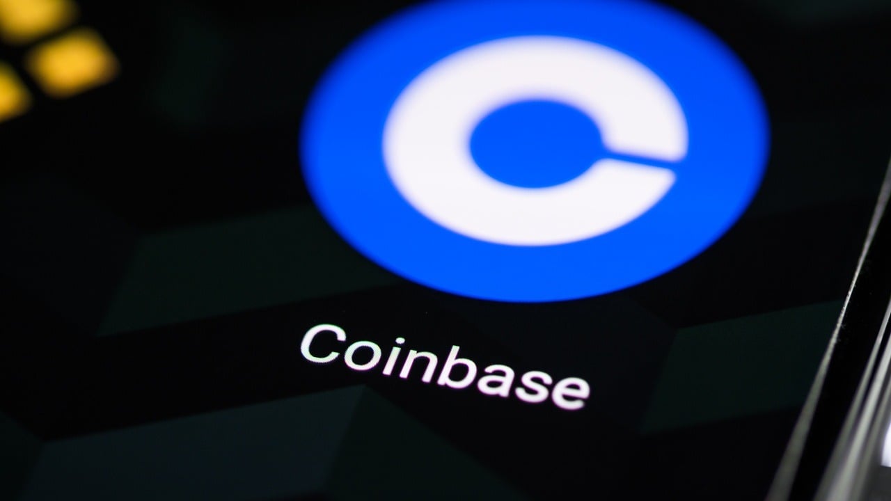 Coinbase logo against a black backdrop.