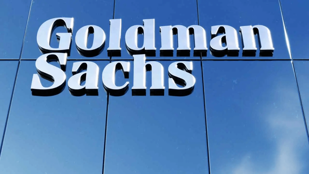 Goldman Sachs signage on a skyscraper.