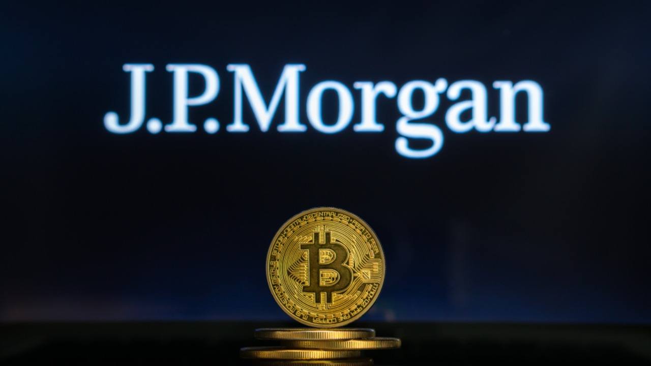 Bitcoin on a stack of coins with JPMorgan logo