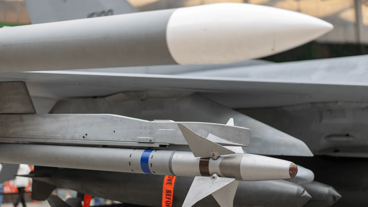 Stack of missiles in daylight.