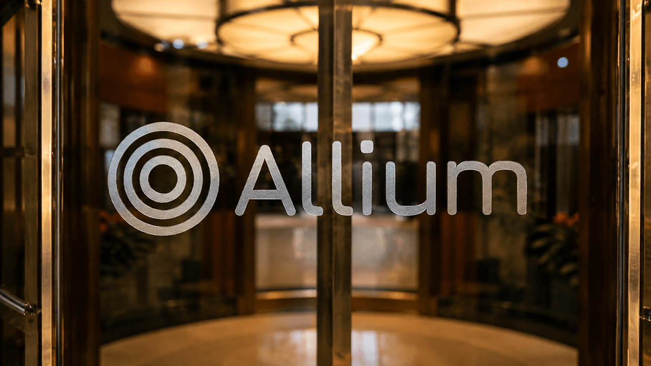 Revolving door image of Allium building entrance.