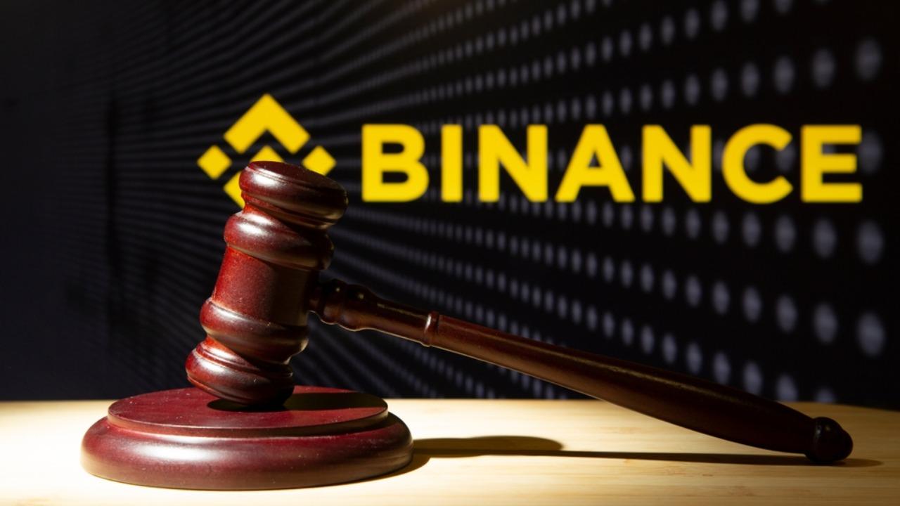 Gavel with binance logo behind