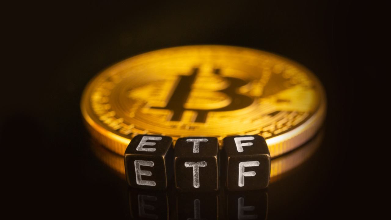 ETF text on dice with bitcoin