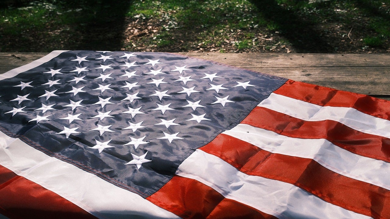 Image of the American flag laid out on the floor.