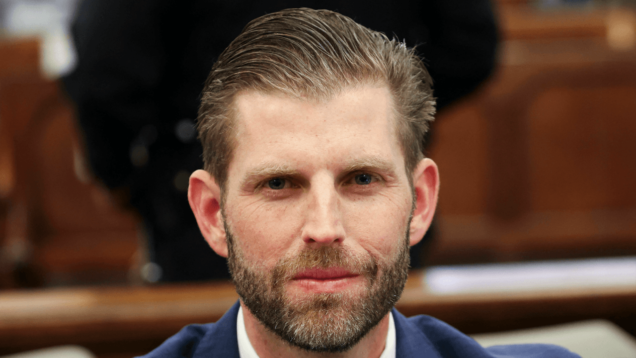 Image of Eric Trump inside an office.