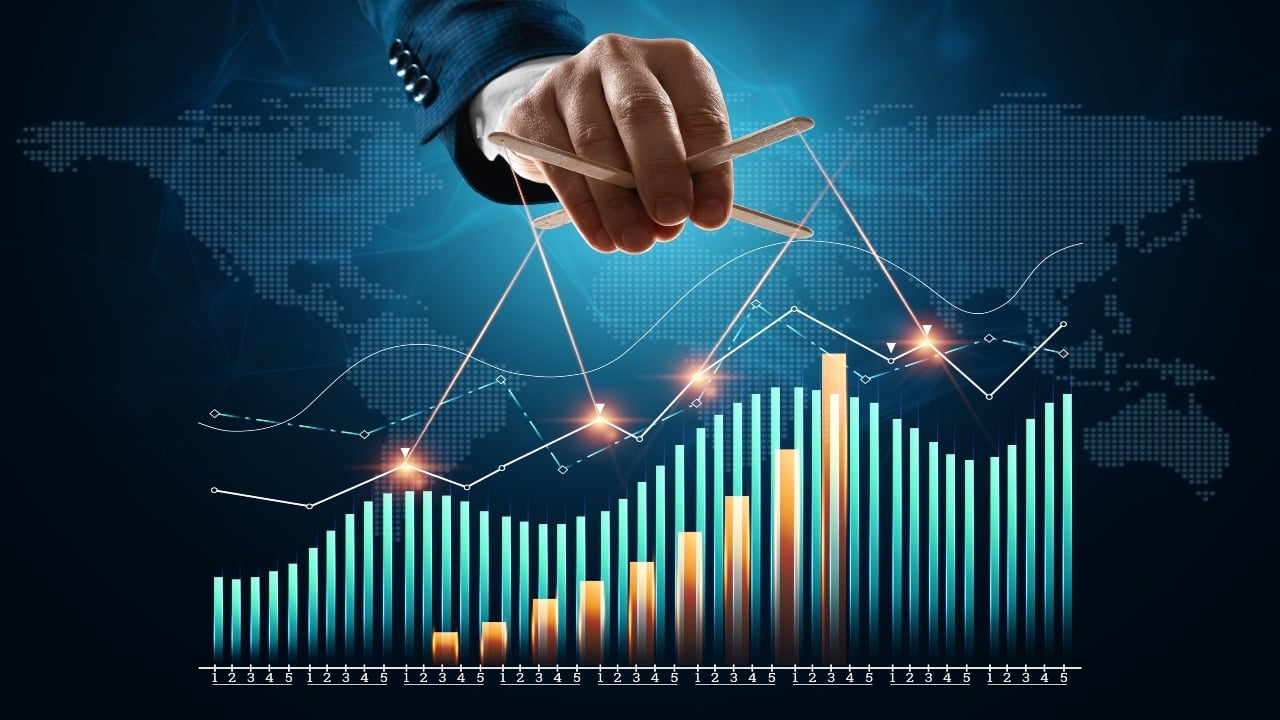male hand manipulates financial charts, business indicators