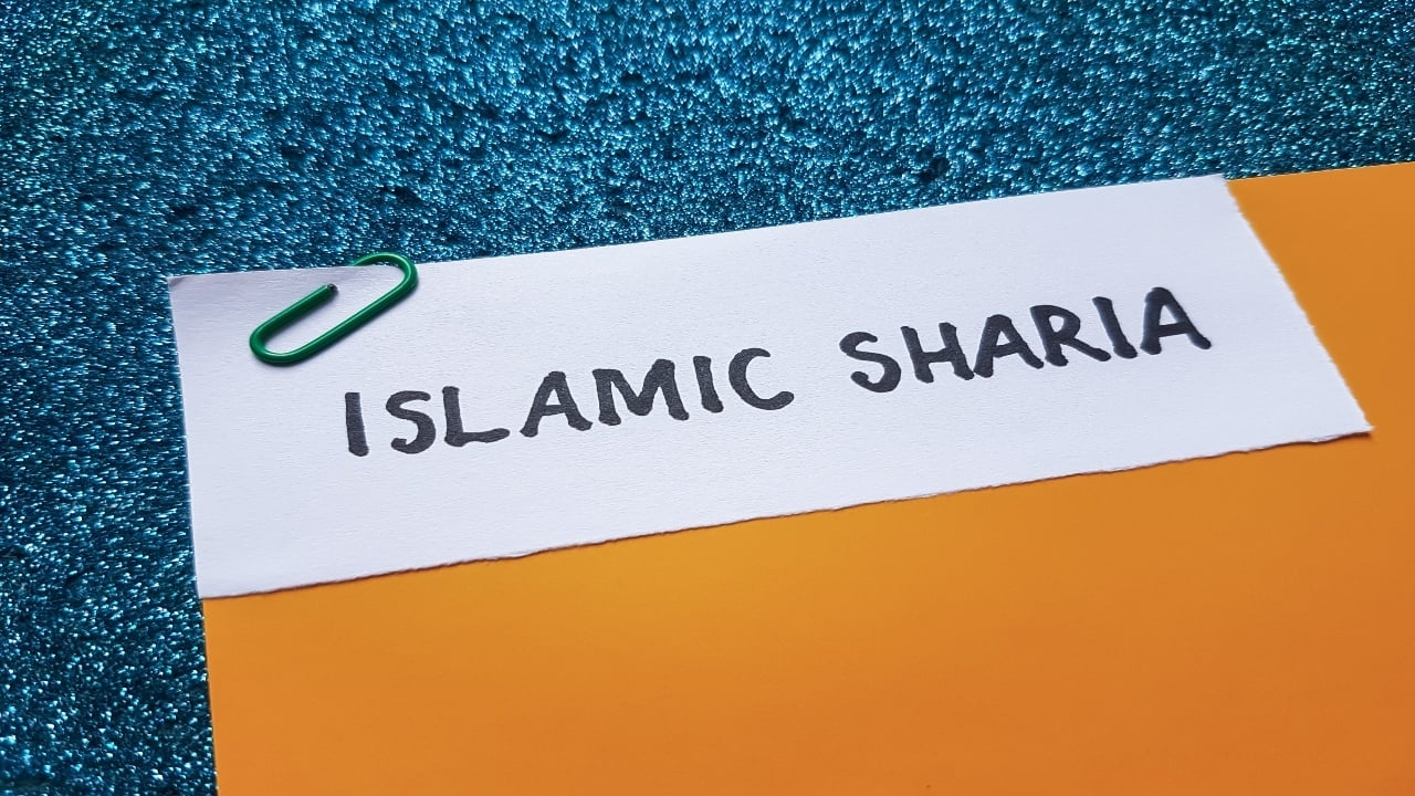 Islamic sharia writting on blue background