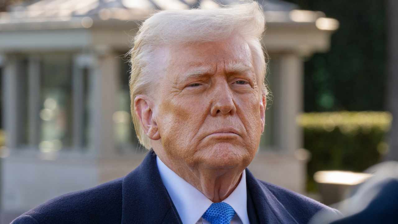 Image of President Donald Trump outside the white house.